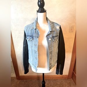 Blank NYC Jean Jacket with vegan leather sleeves. In very good condition, size M